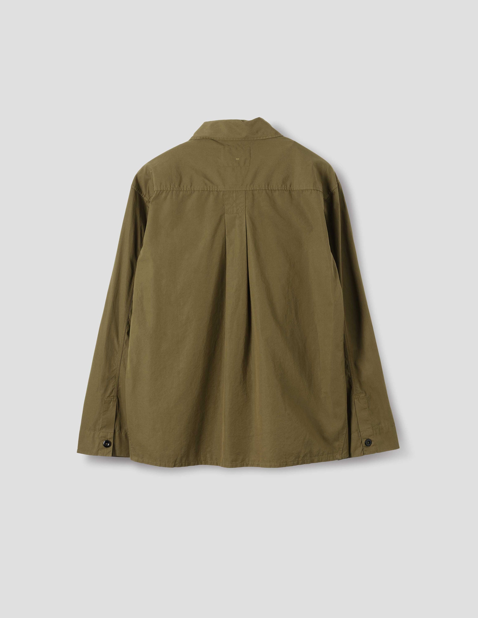 Green cotton poplin shirt with stitch through back yoke, box pleat and grown-on cuffs finished with dark corozo buttons, back flat lay view.
