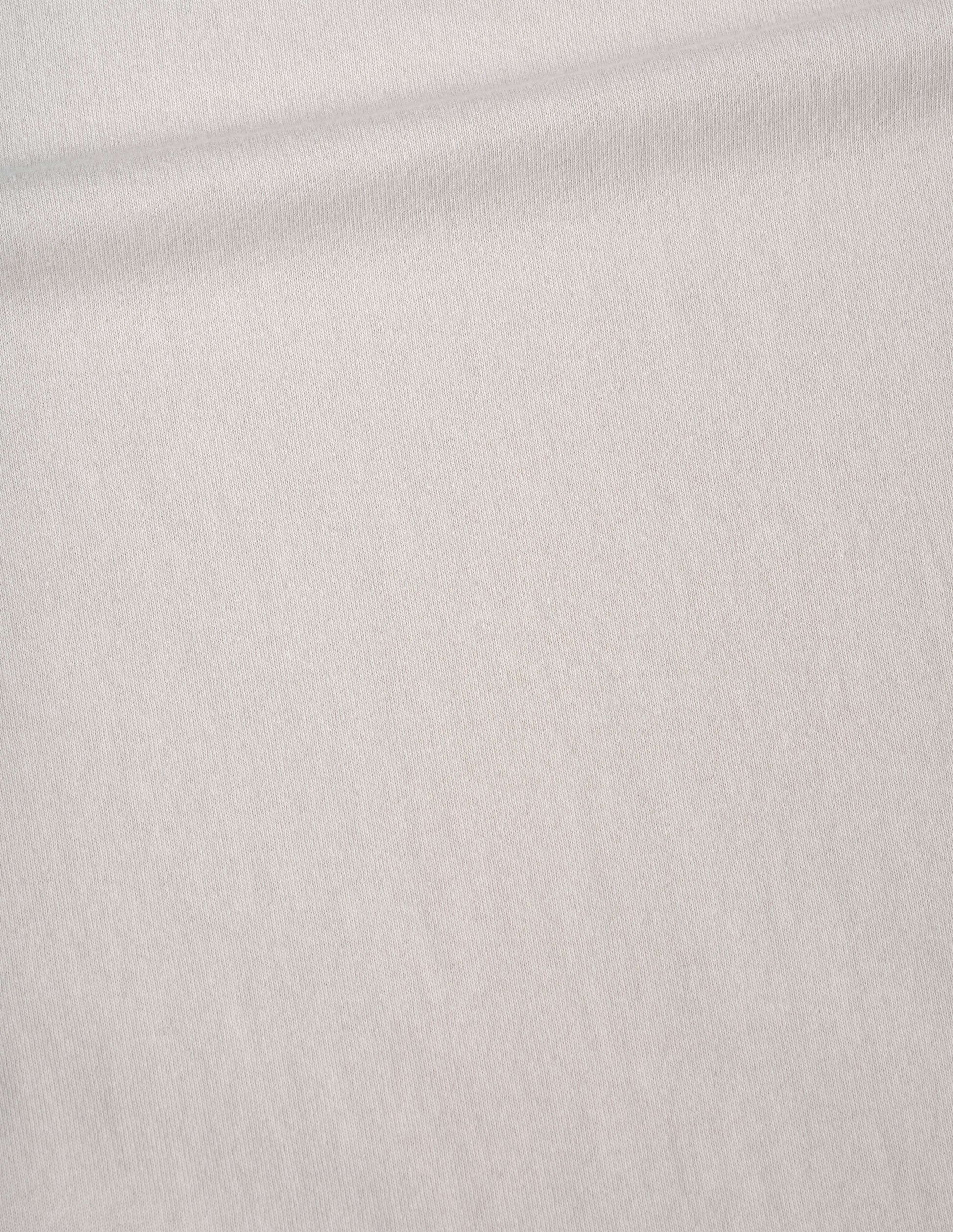 Off white matte jersey Guernsey t shirt, fabric swatch.