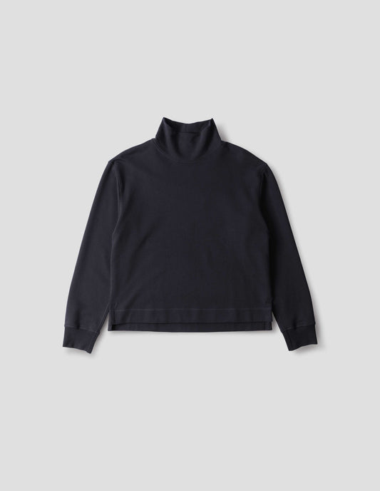Dark navy loose funnel neck sweatshirt with single rib on cuffs and flatlock stitching on seams, stepped vent split hem, front flat lay view.