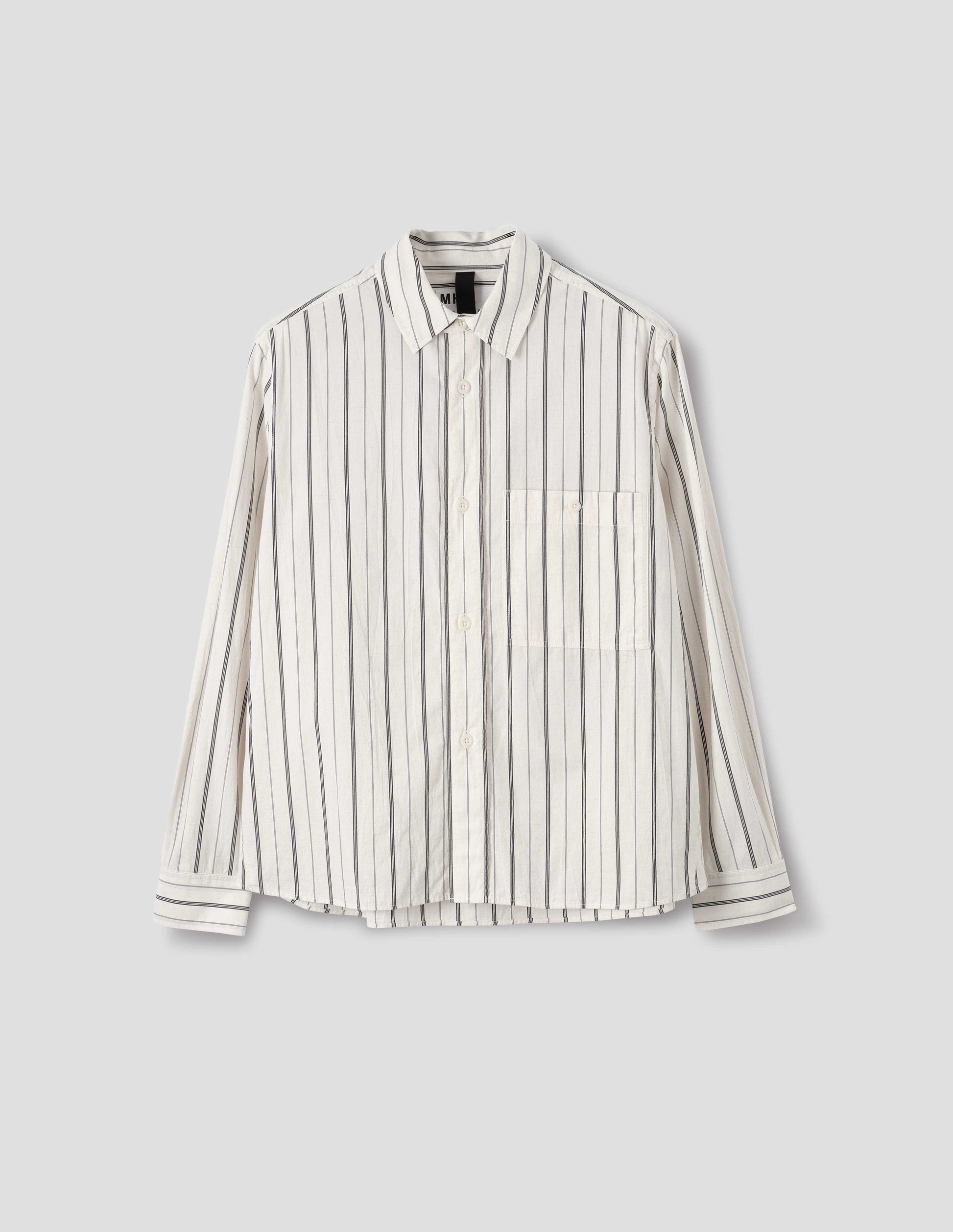 Off white and dark blue stripe cotton shirt, with light buttons and button-through chest patch pocket, front flat lay view.