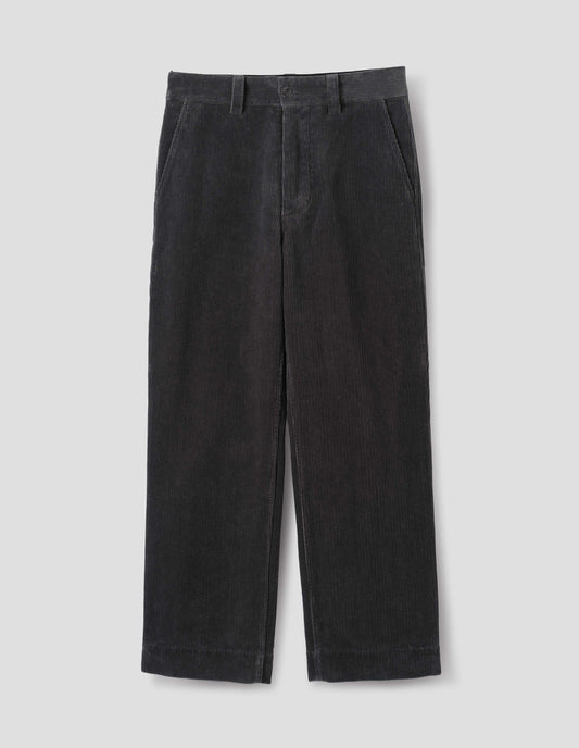 Dark grey cotton corduroy trousers with belt loops, a button fastening and slanted side entry pockets. Front flat lay view.