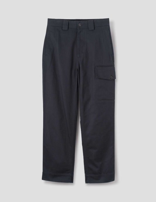 Dark blue cotton trousers, with wide belt loops and a dark button with a large cargo pocket with pocket bag and button fastening, front flat lay view.