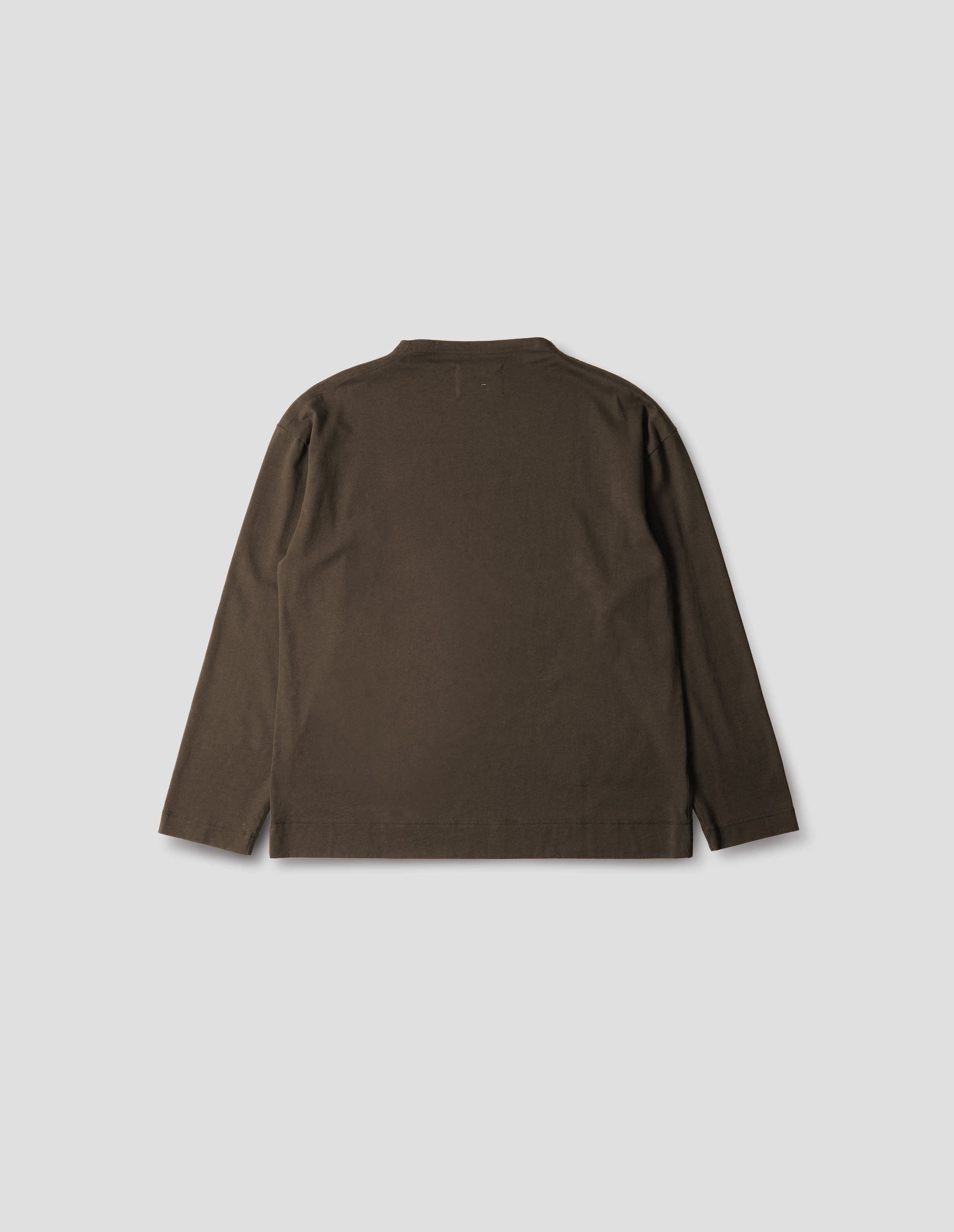 Brown cotton t shirt, with long sleeves and flatlock stitching around cuffs and hem, back flat lay view.