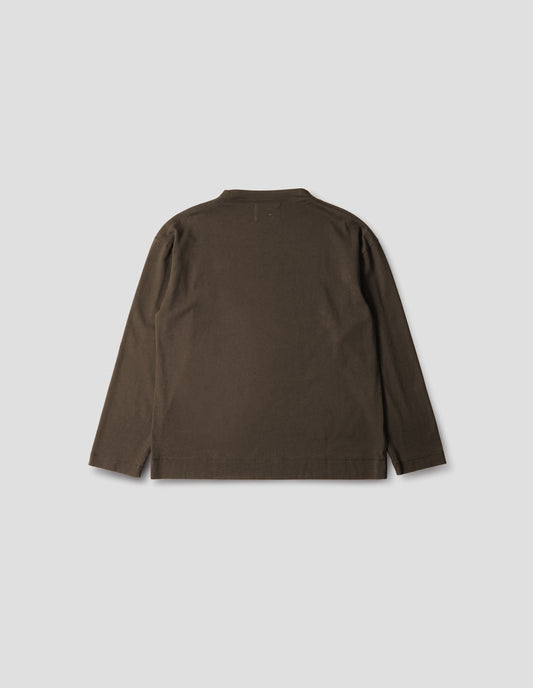Brown cotton t shirt, with long sleeves and flatlock stitching around cuffs and hem, back flat lay view.