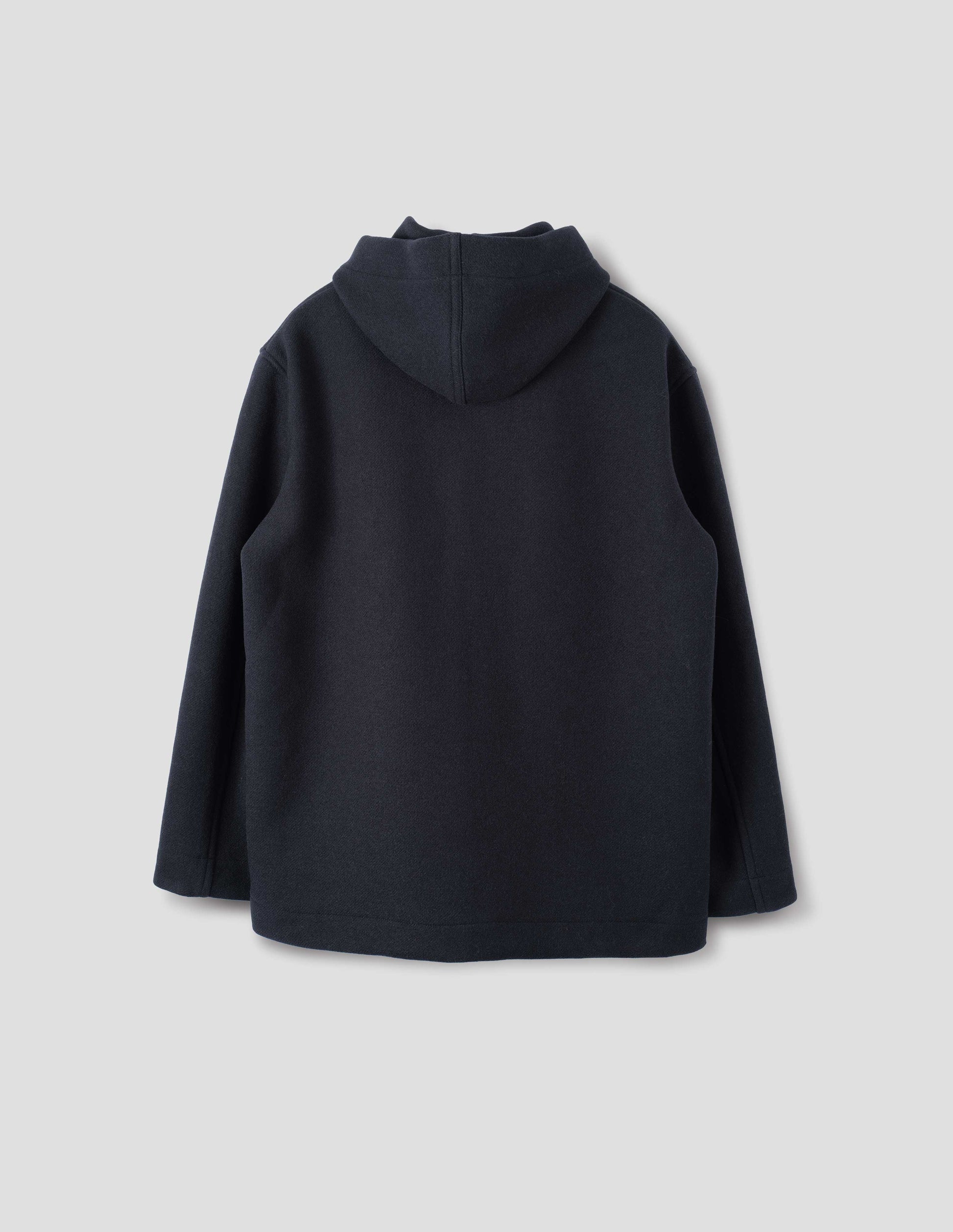 Dark navy wool coat, with a hood, straight cuffs and hems. Back flat lay view.