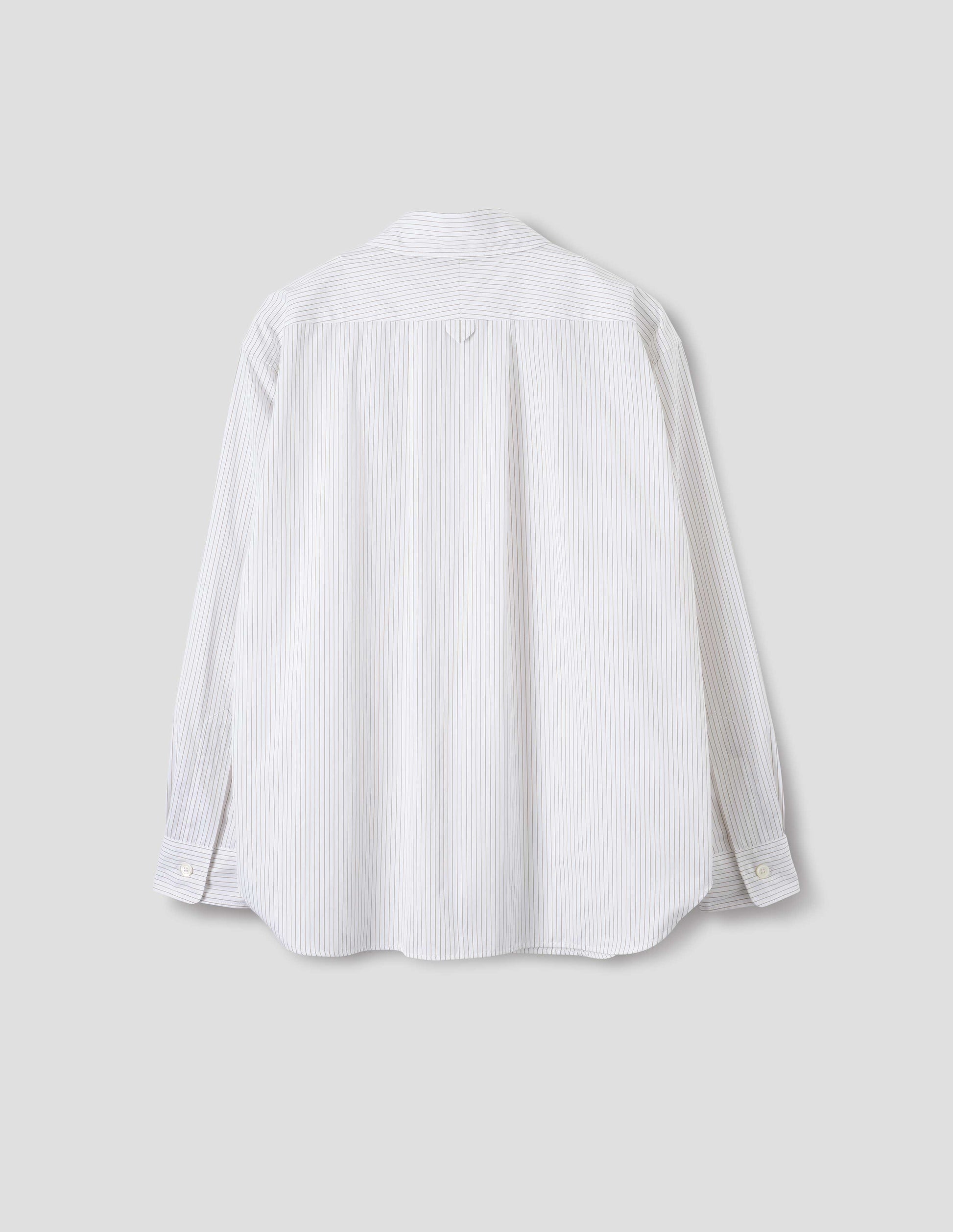 White cotton shirt with green stripes, split yoke with hanger loop detail on back, contrast cuffs with mother of pearl buttons in self fabric and curved hem. Back flat lay view.