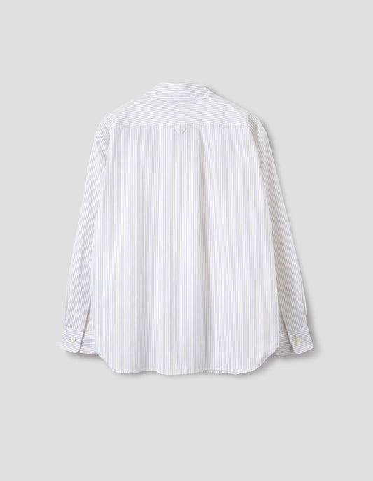 White cotton shirt with green stripes, split yoke with hanger loop detail on back, contrast cuffs with mother of pearl buttons in self fabric and curved hem. Back flat lay view.