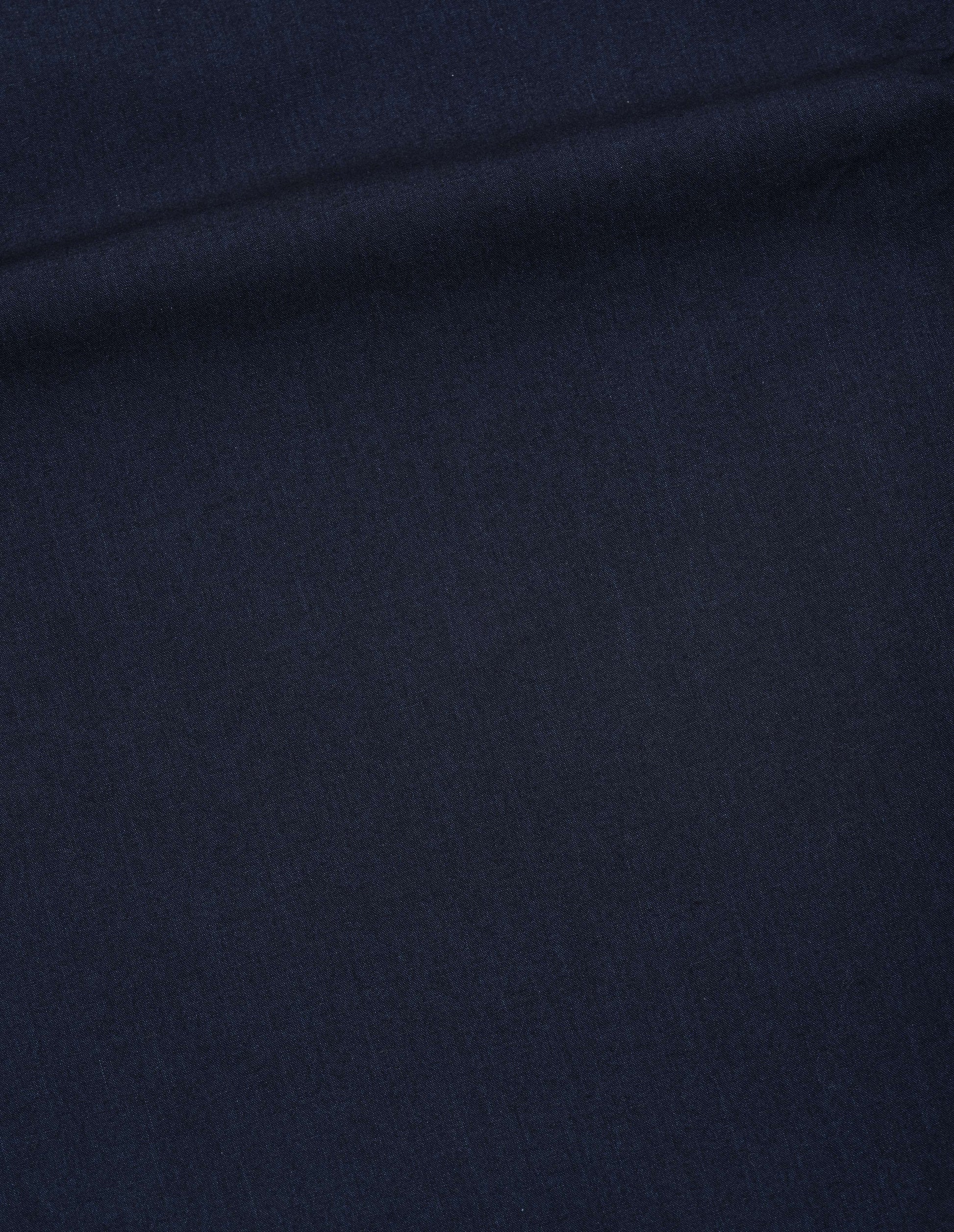 Dark blue indigo poplin shirt fabric swatch.
