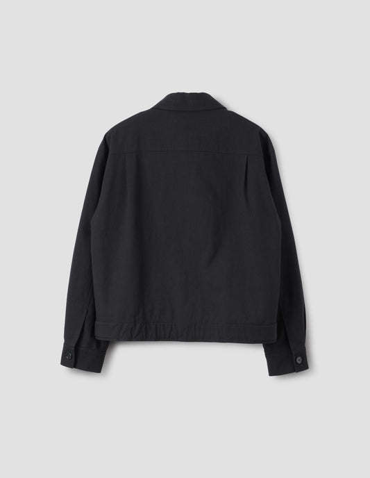 Black jacket with horn button cuffs and waist tab adjusters, back flat lay view. 