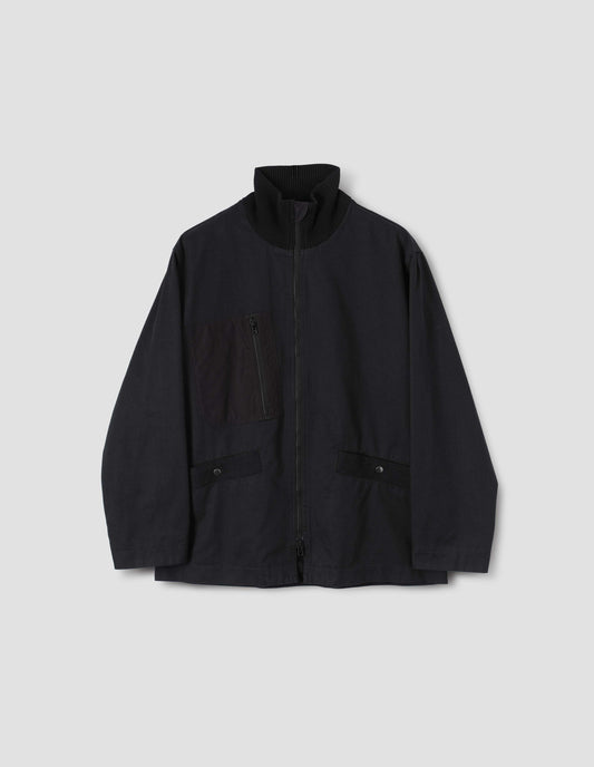 Dark navy jacket with contrast ribbed collar, contrast zip chest pocket and contrast Vislon zip, front flat lay view.