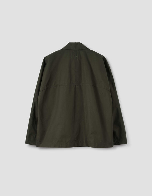 Green raglan sleeve jacket with split panel detailing on back yoke, back flat lay view.