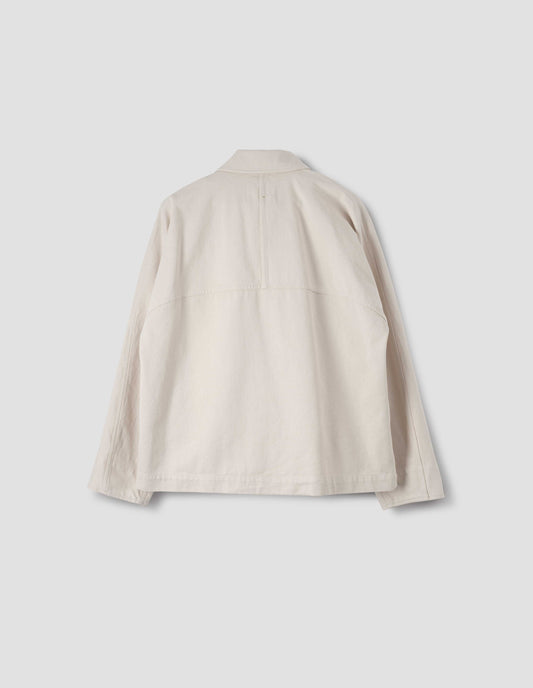 Off white raglan sleeve jacket with split panel detailing on back yoke, back flat lay view.