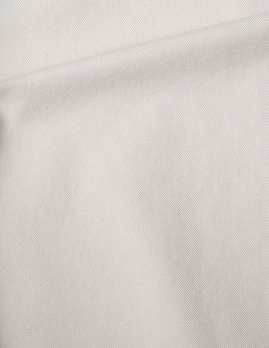 Off white raglan jacket cotton denim fabric swatch.