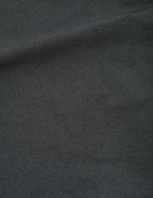 Charcoal grey trousers, dry cotton linen fabric swatch.