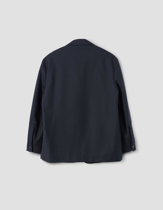Dark navy blazer with horn button cuffs, back flat lay view.