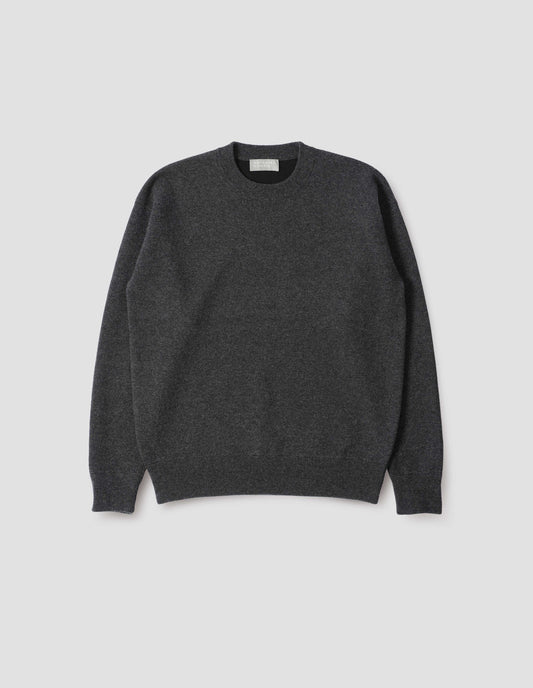 Dark grey knitted sweatshirt with rib collar, cuffs and hem. Front flat lay view.