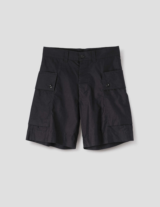 Black cotton shorts with cargo pockets, belt loops and corozo brace button closure. Front flat lay view. 
