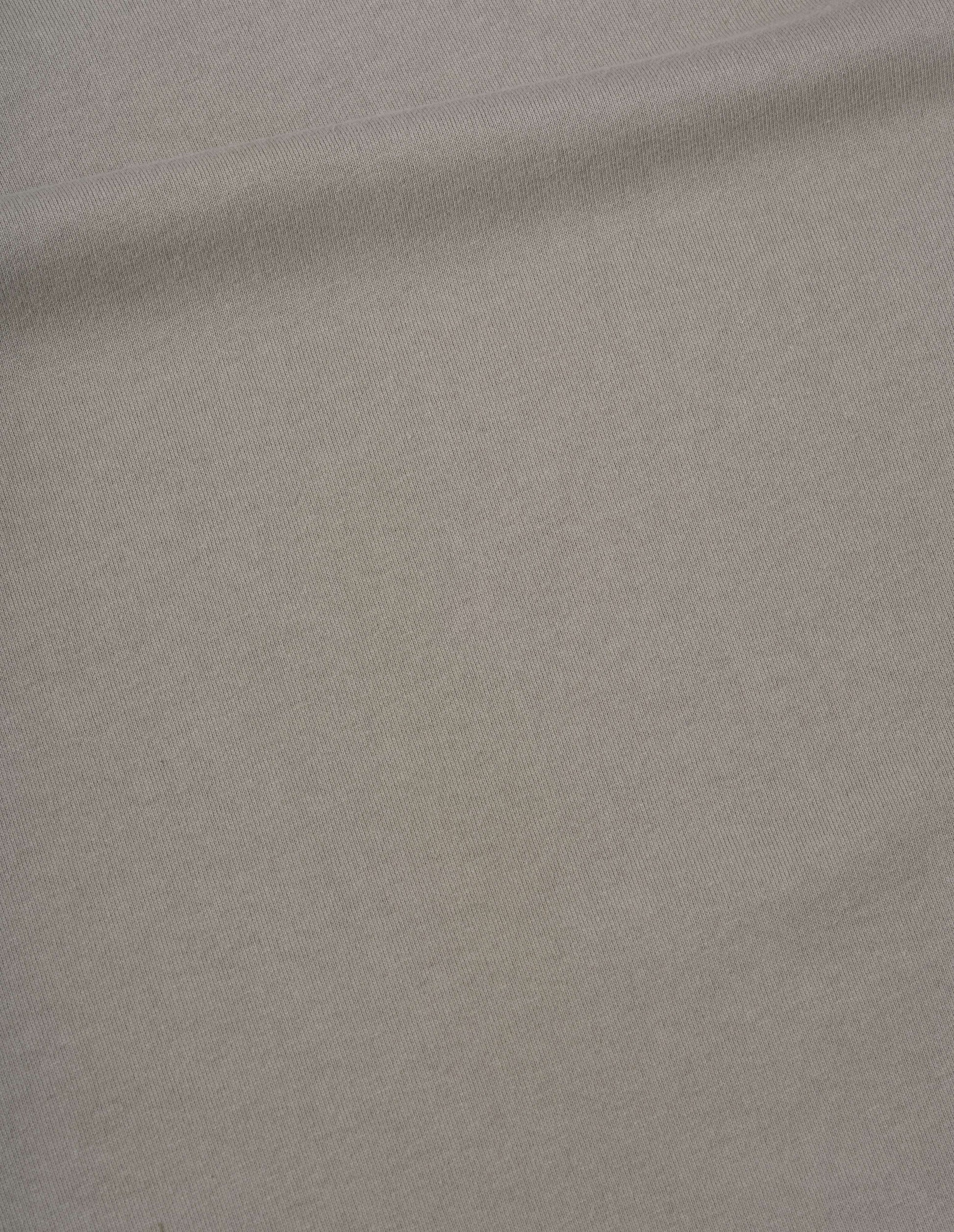 Greenish beige matte jersey t-shirt, fabric swatch.