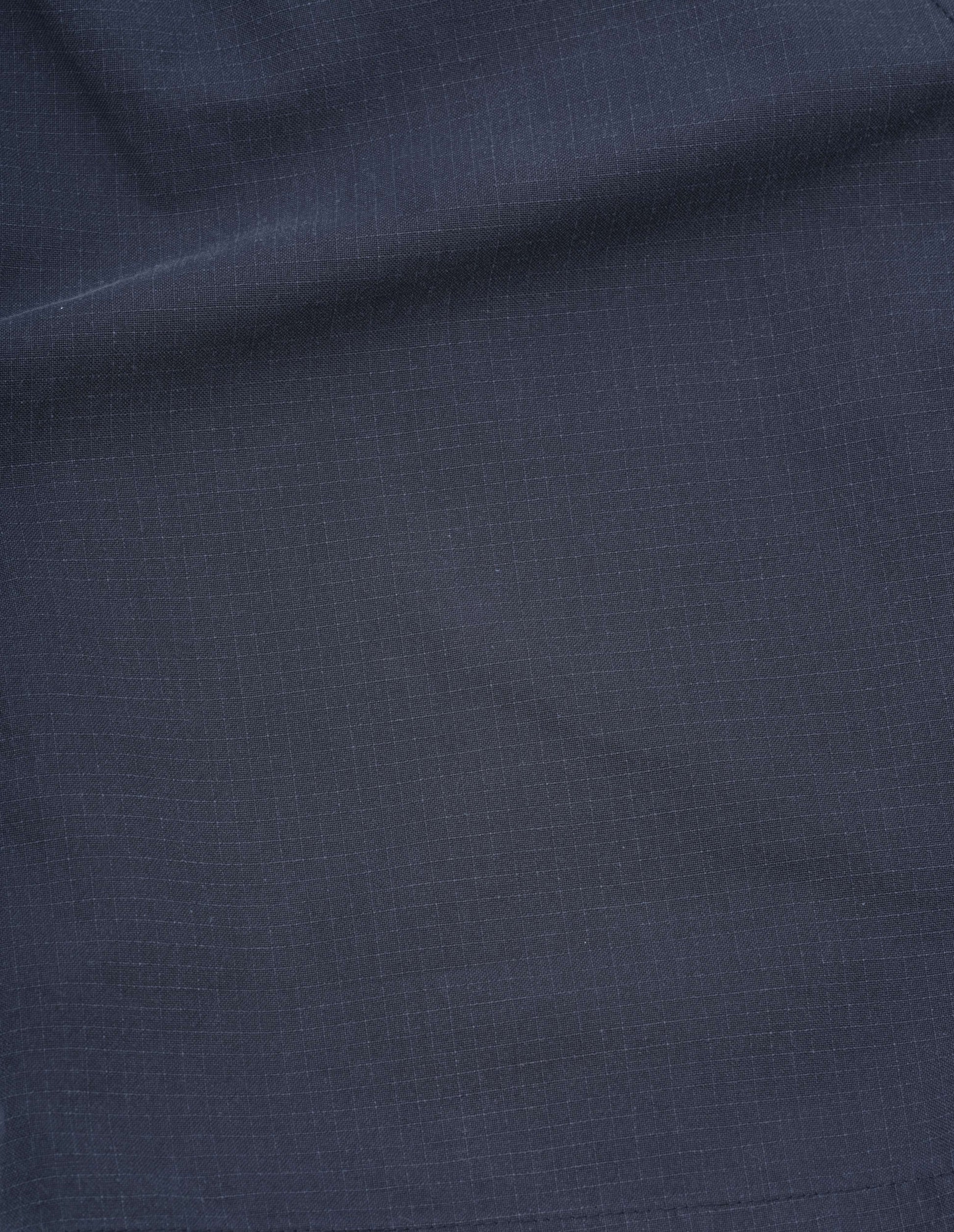 Dark blue washed cotton ripstop shorts fabric swatch.