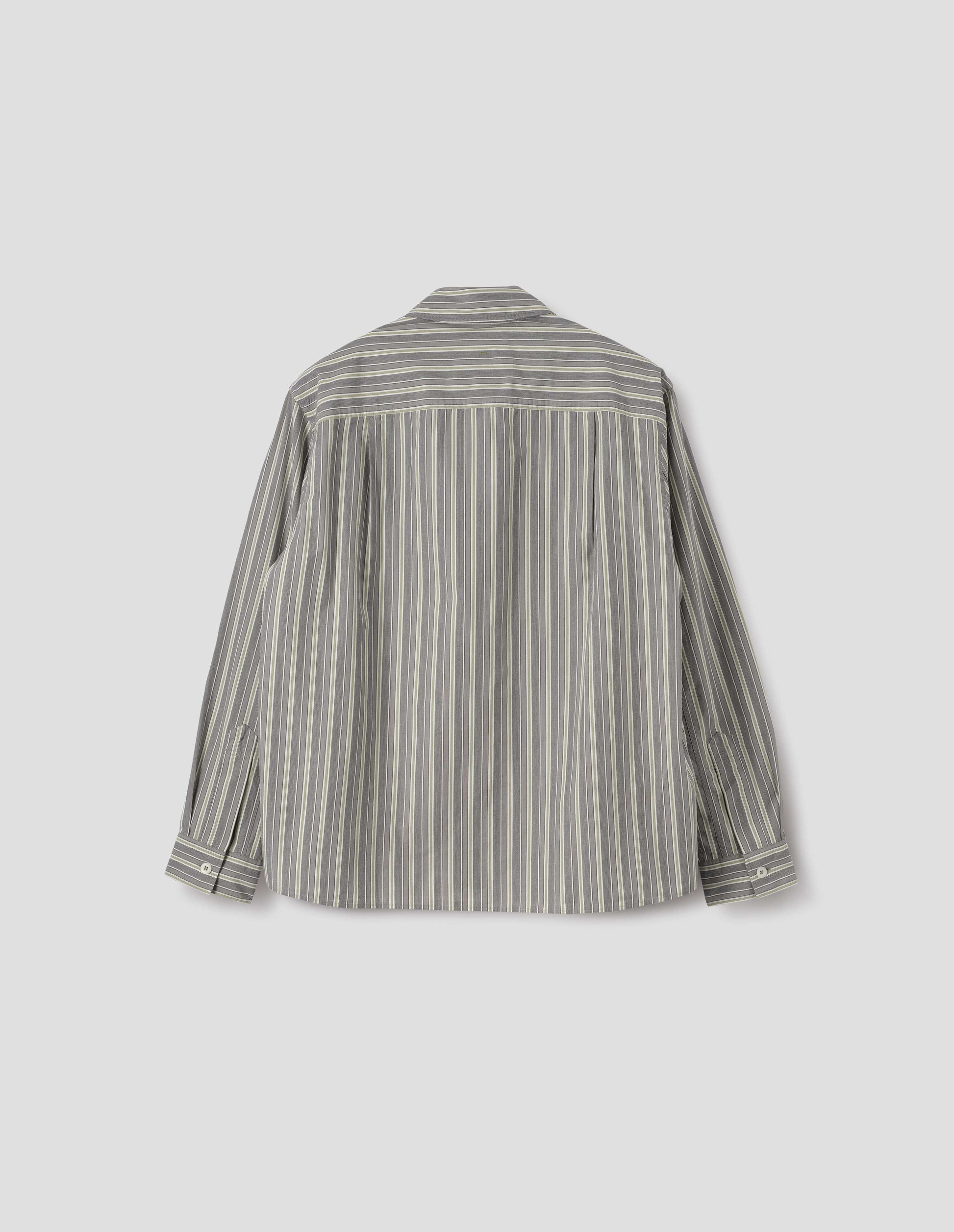 Grey, white and yellow striped long sleeve cotton shirt. With dropped shoulder, corozo brace button cuffs and pleats on back yoke. Back flat lay view.