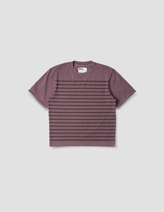 Purple short sleeve cotton t-shirt with brown stripes, flatlock stitch seam detailing and rolled raw sleeve hems held with a single bar tack. Front flat lay view.
