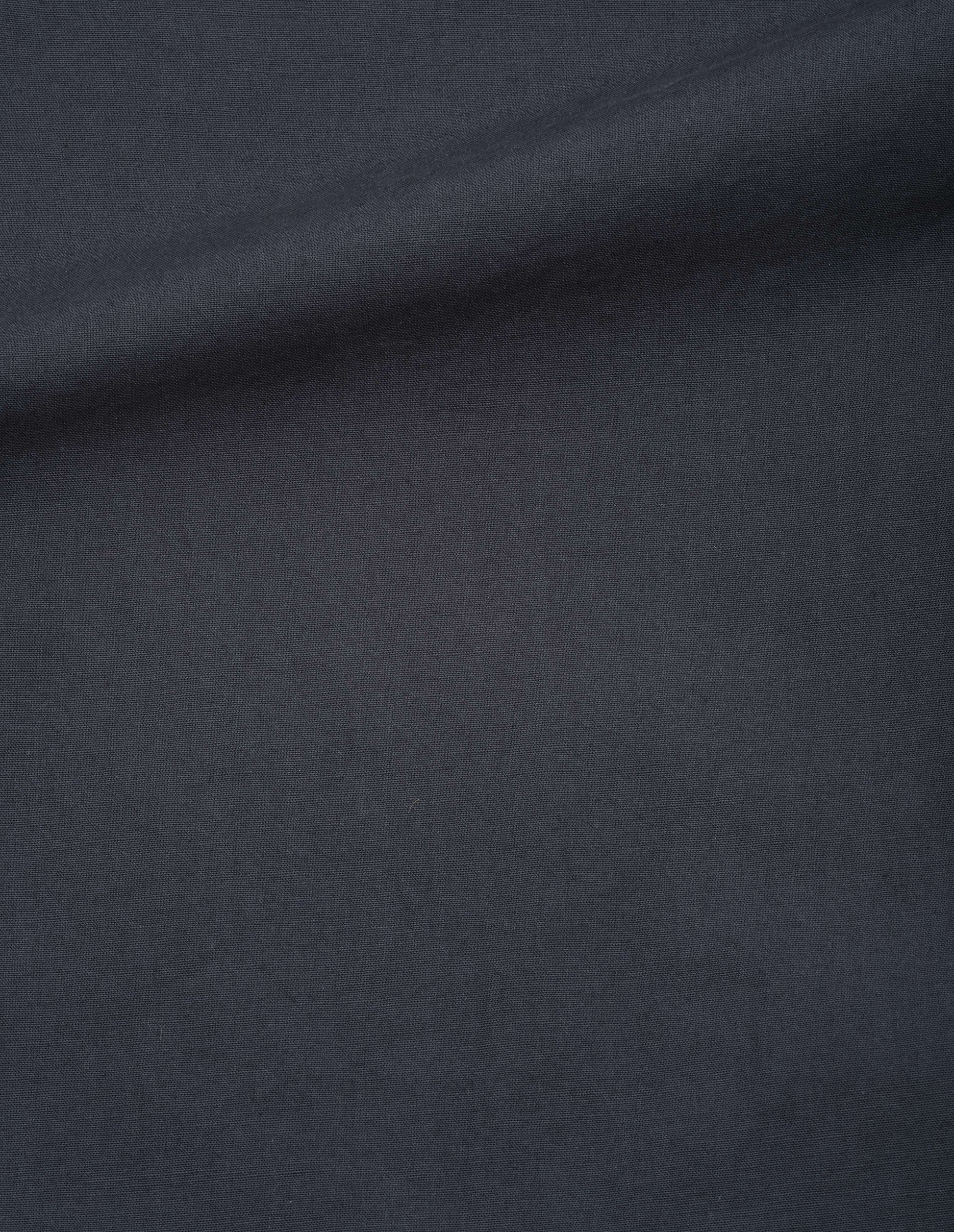 Dark blue coarse yarn cotton trousers, fabric swatch. 