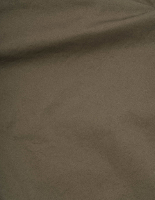 Brownish green cotton blend cordura trousers, fabric swatch.