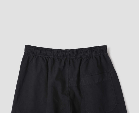 Black joggers with elasticated waist and  patch back pocket. Back flat lay view.