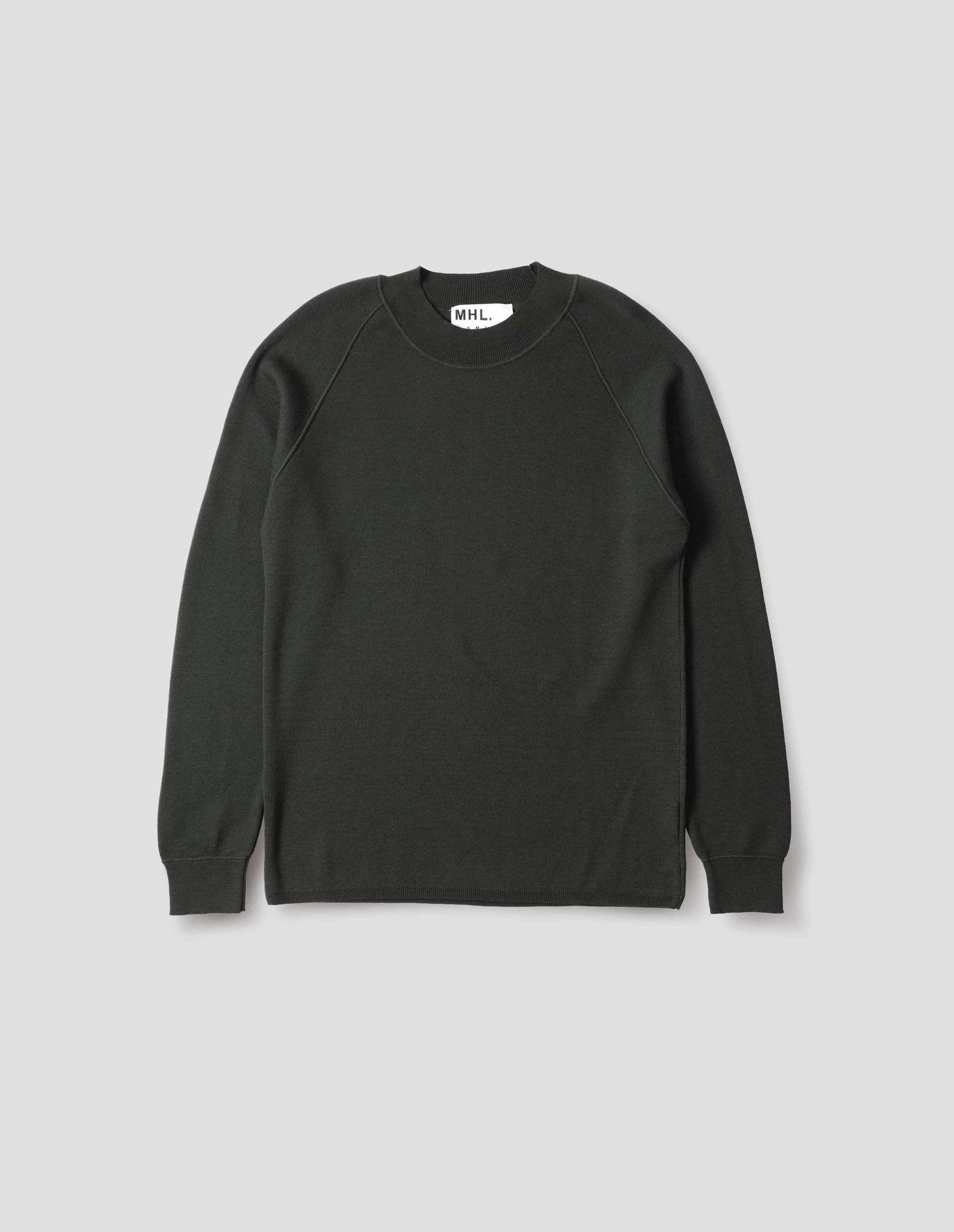 Dark grey merino wool sweatshirt with raglan sleeve and contrast rib on neck, cuffs and hem. Front flat lay view.