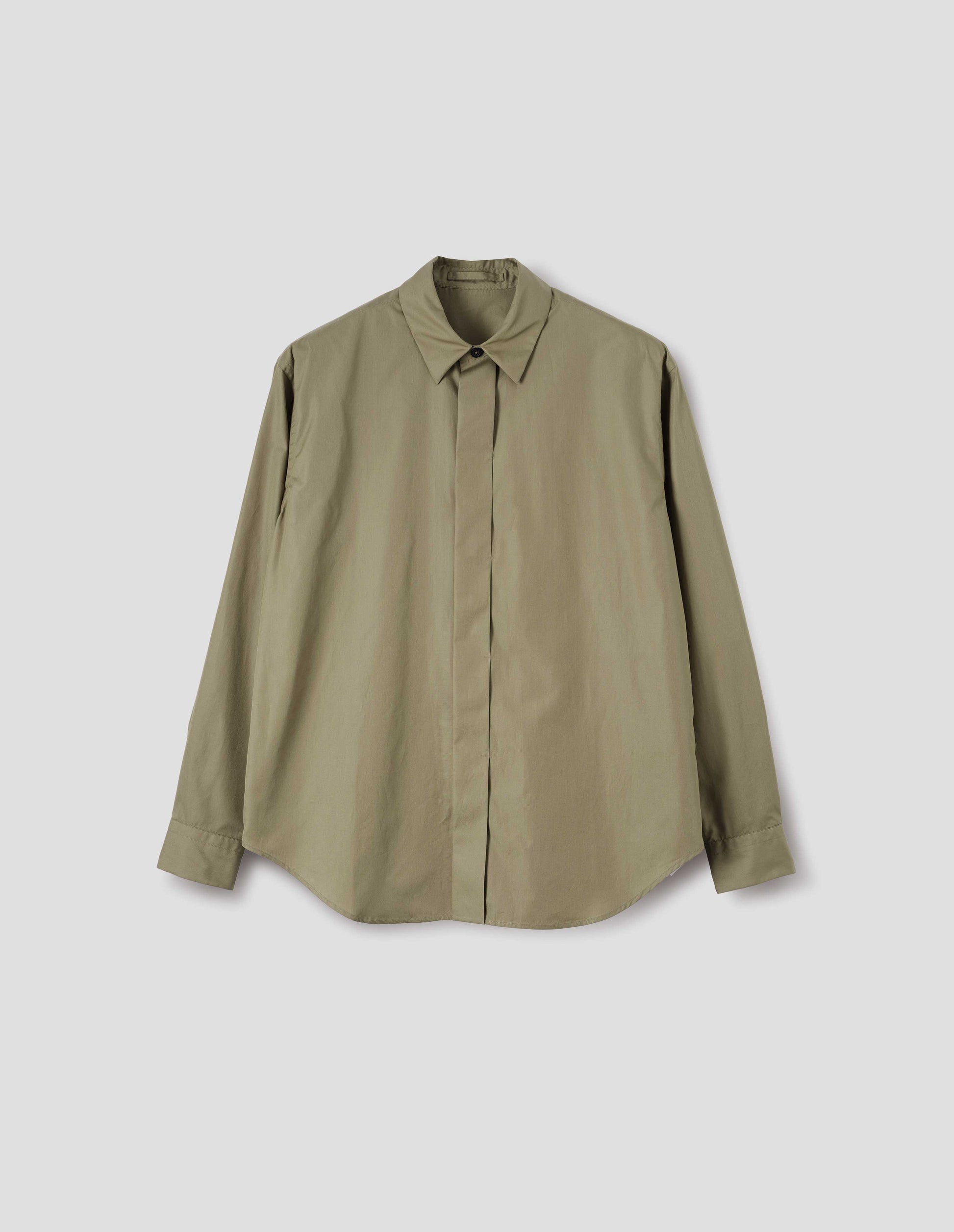 Beige cotton poplin long sleeve shirt with concealed button placket, curved hem and hanger loop on inside collar. Front flat lay view. 