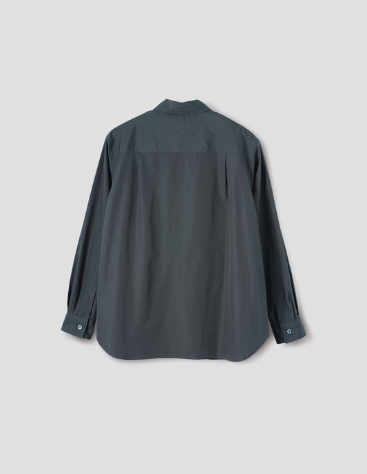 Dark greenish blue long sleeve cotton shirt, with mother of pearl buttons cuffs and pleats on back yoke. Back flat lay view.