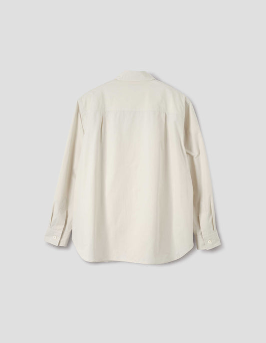 White long sleeve cotton shirt with mother of pearl buttons on cuffs and pleats on back yoke. Back flat lay view.