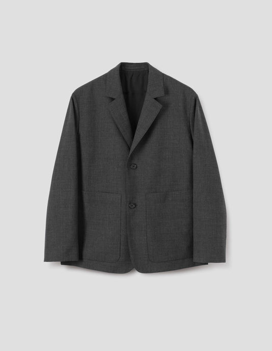 Grey crisp wool blazer with horn button fastening, patch pockets, contrast lining and hanger loop on inside collar. Front flat lay view. 