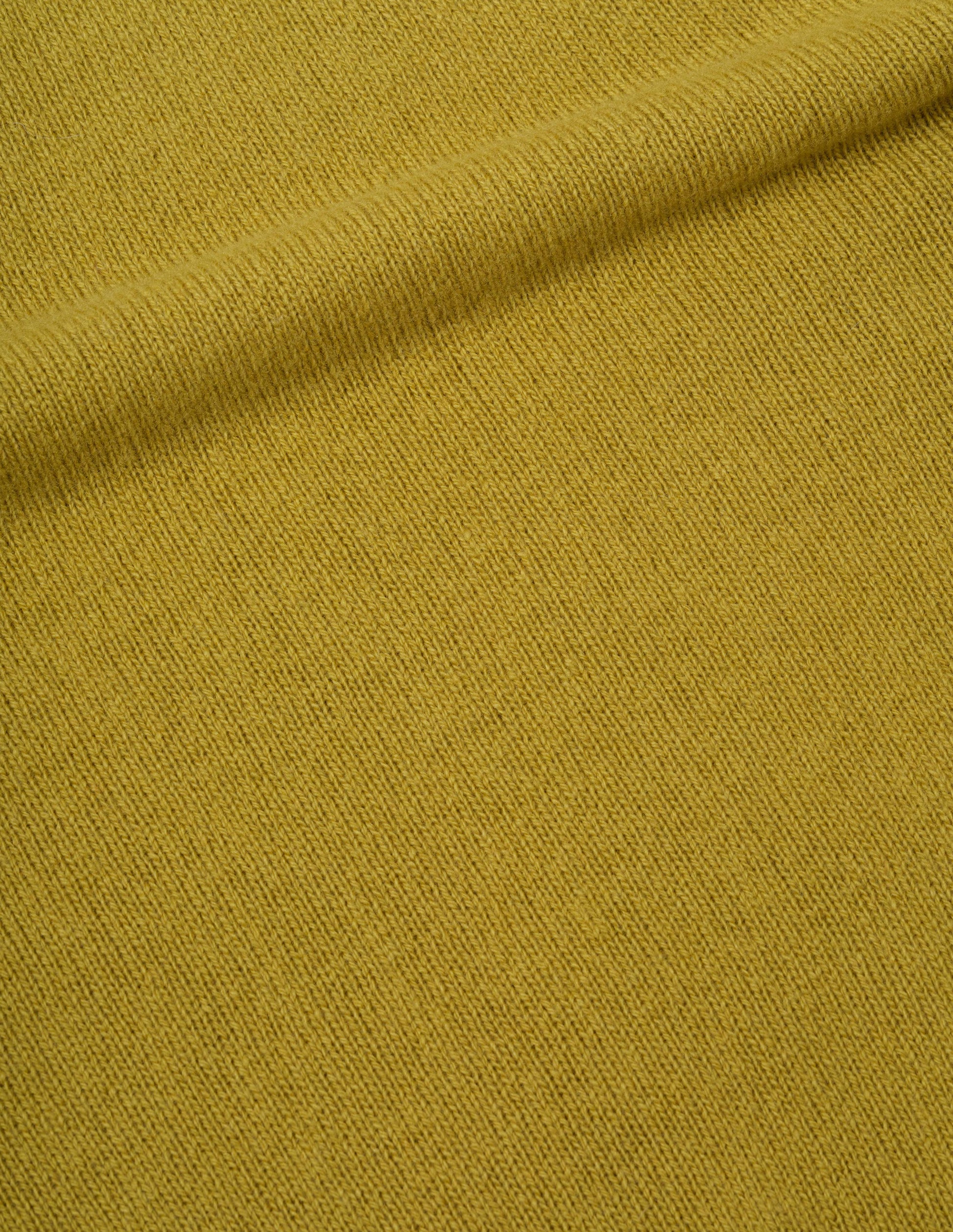 Yellow soft merino crew neck jumper, fabric swatch.