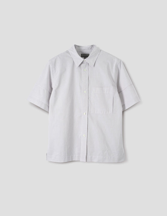 White shirt with grey stripes, panels on short sleeves with contrasting band at cuff, mother of pearl buttons on raised placket, bellows chest patch pocket and side split vents. Front flat way view.