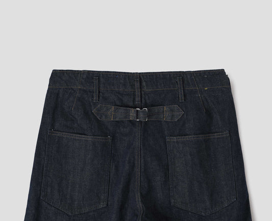 Indigo denim twill jeans, with metal button fly, grown on waistband with belt loops and back pockets with half cotton lining. Back flat lay view.