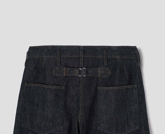 Black denim twill jeans, with metal button fly, grown on waistband with belt loops and back pockets with half cotton lining. Back flat lay view.