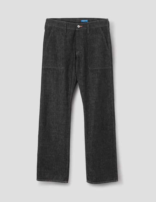 Black denim twill jeans, with metal button fly, grown on waistband with belt loops and stitch-through slant pockets. Front flat lay view.