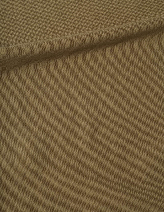 Beige heavy cotton canvas apron fabric swatch.