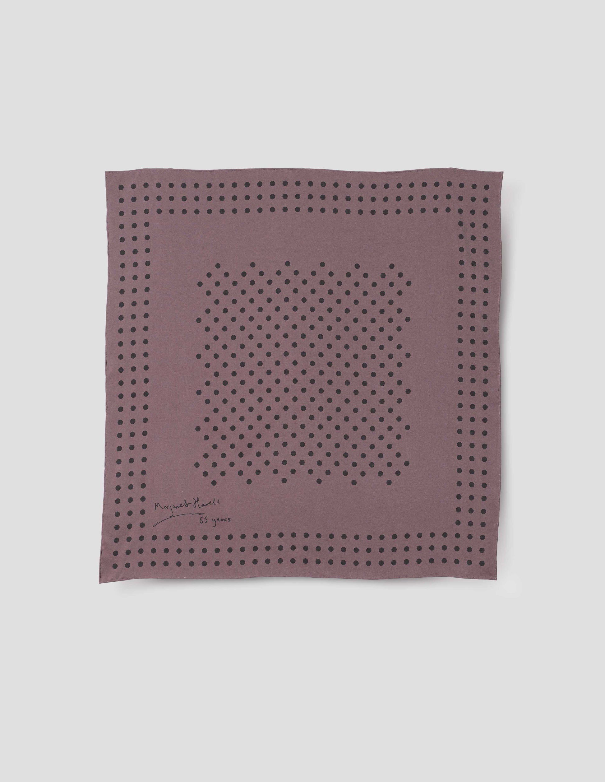 Purple square silk neck scarf with dark purple dots, hand rolled edges and Margaret Howell logo.  Front flat lay view.