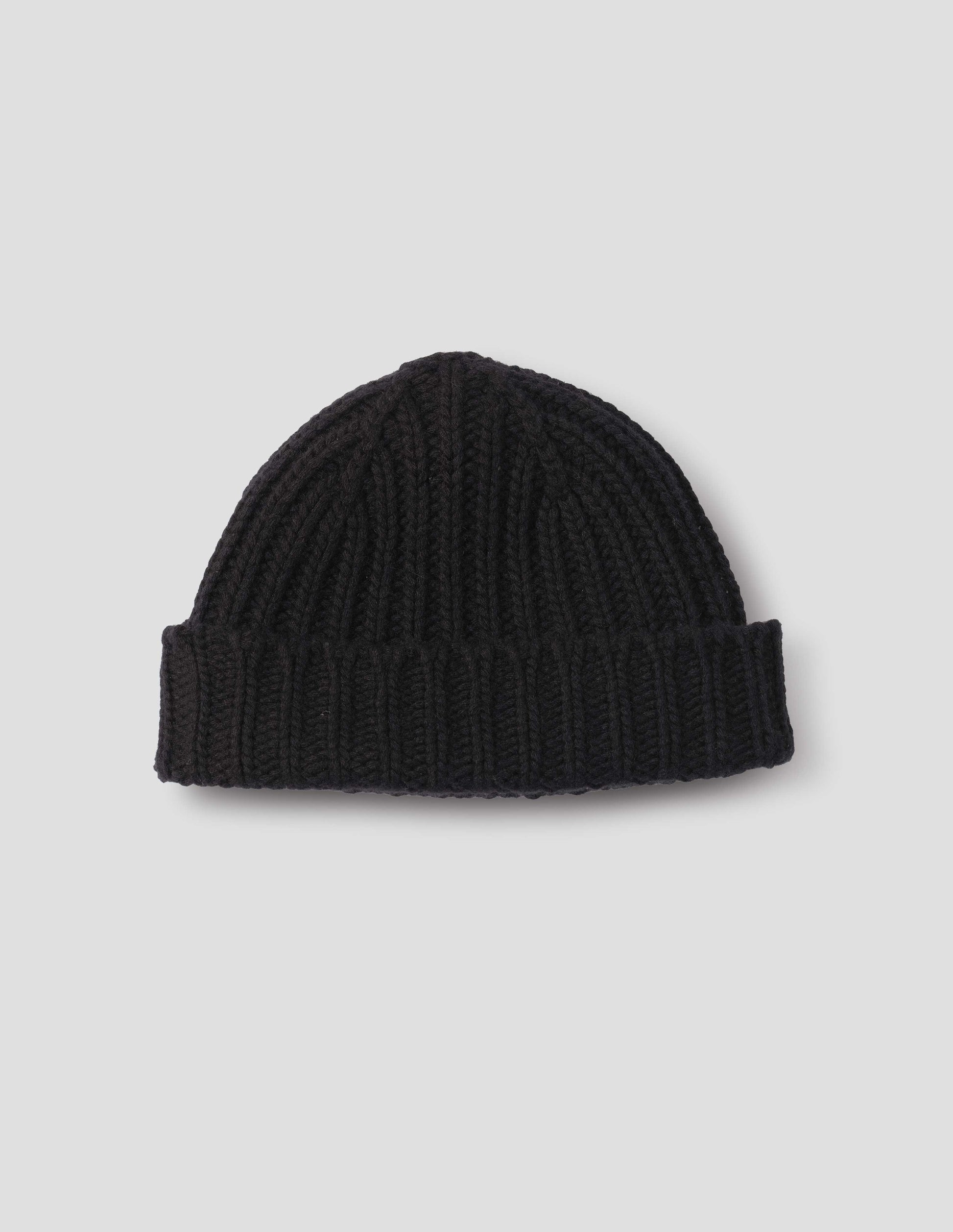 Black chunky knitted cashmere beanie, front flat lay view.
