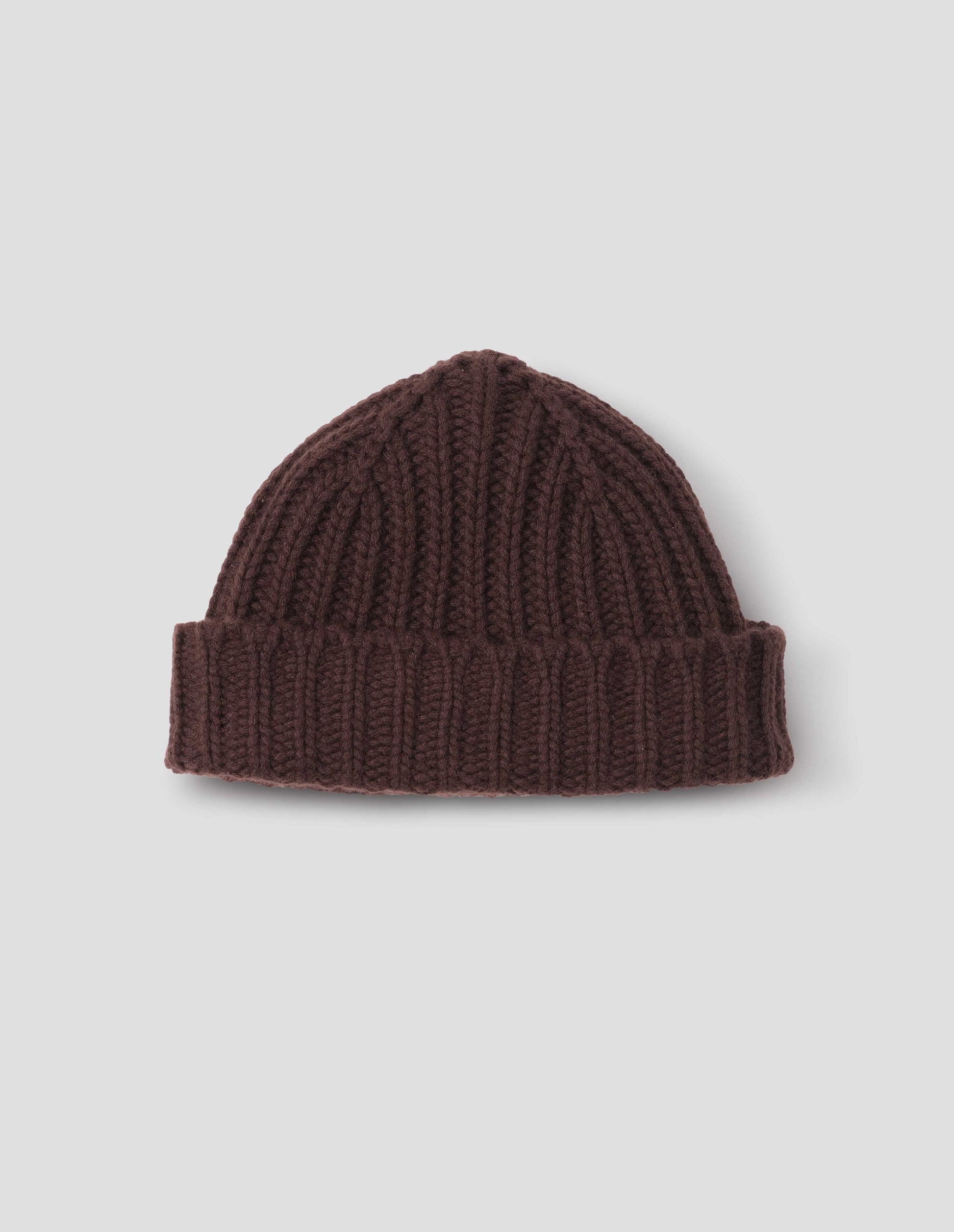 Dark brown chunky knitted cashmere beanie, front flat lay view.
