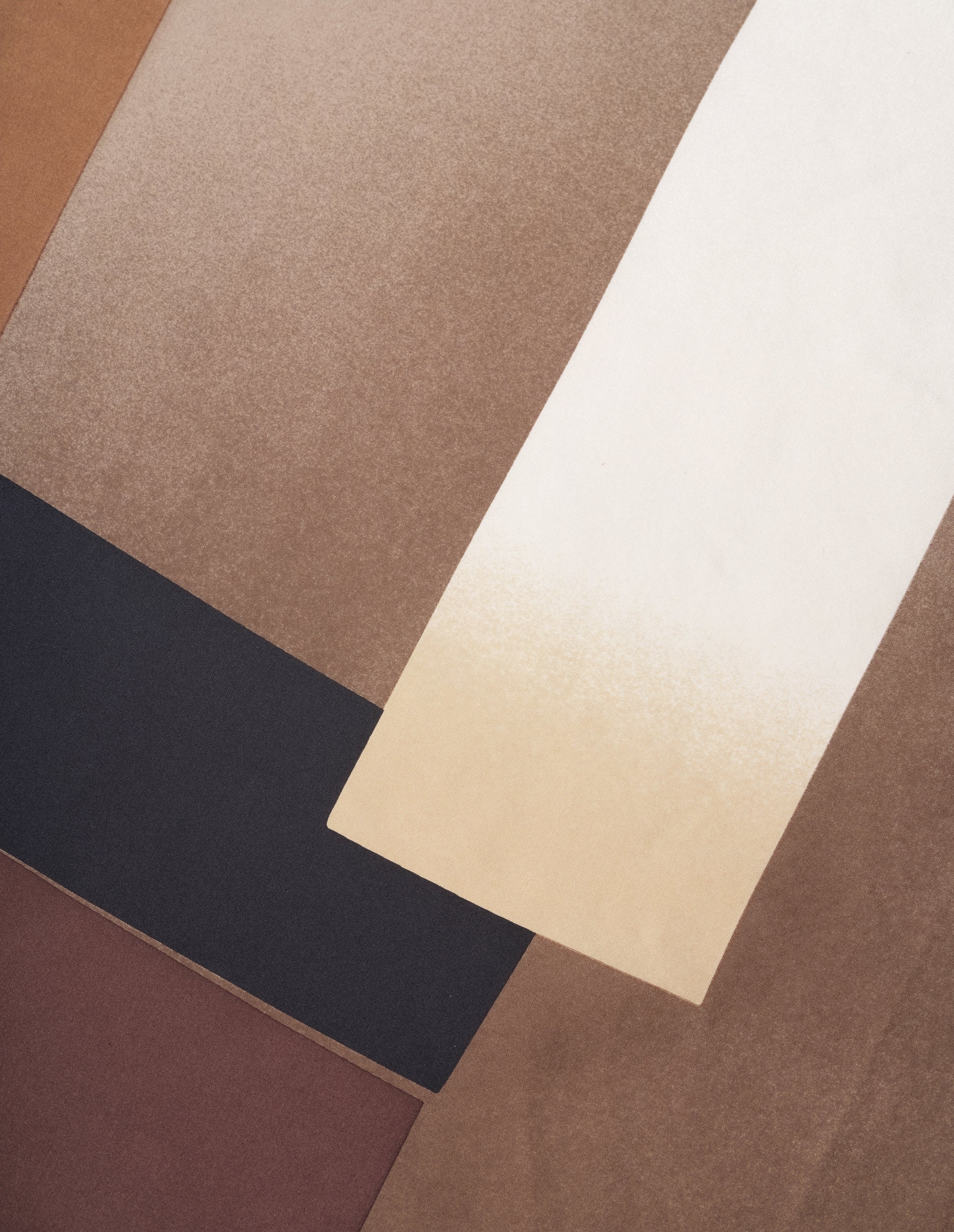 Light brown silk scarf with beige, brown and black collage print fabric swatch.