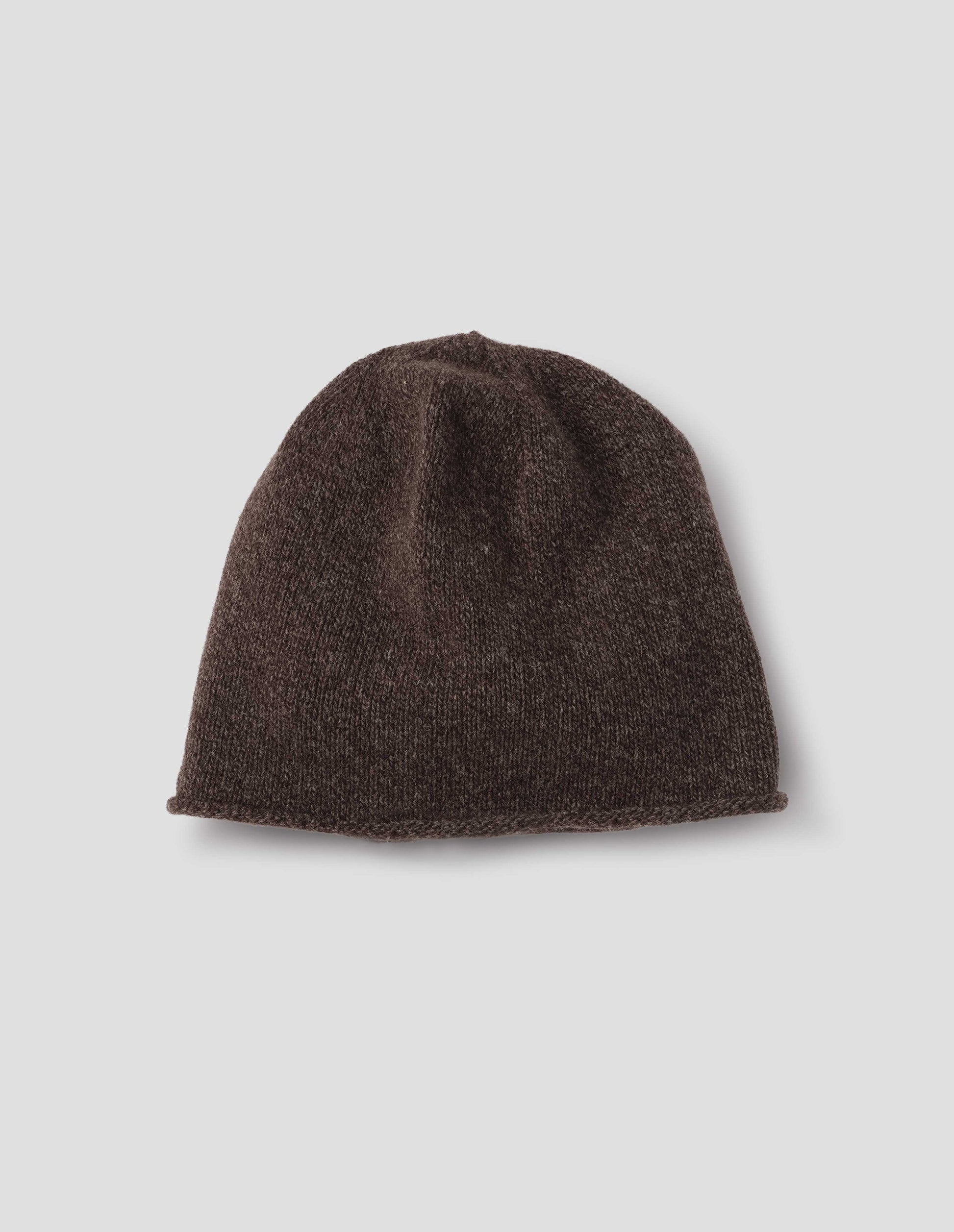 Brown cashmere and wool beanie hat with rolled edge brim, front flat lay view.