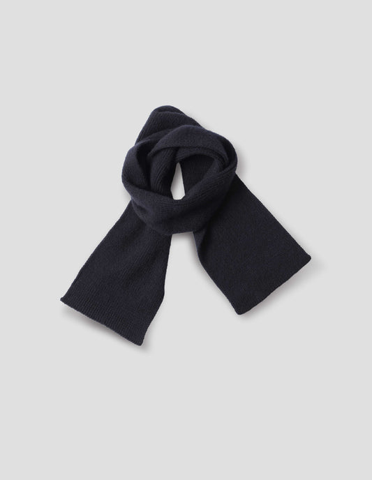 Dark navy blue knitted wool scarf, front flat lay view.