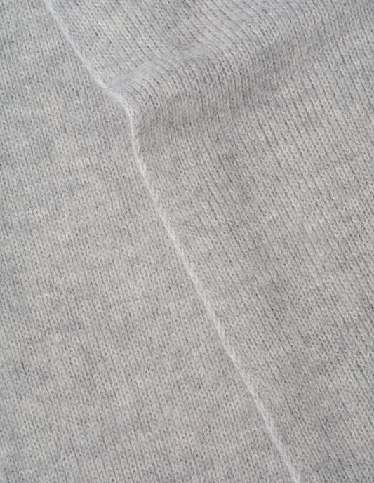 Grey knitted wool scarf, fabric swatch.