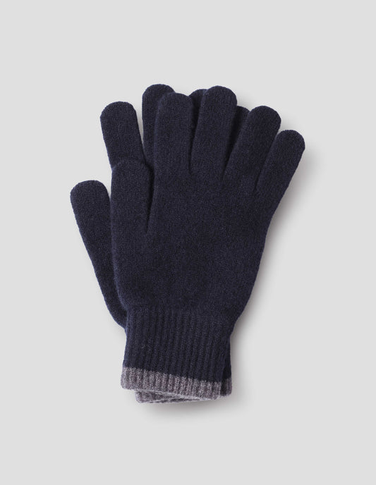 A pair of navy blue gloves with contrast grey ribbed detailing on cuff, front flat lay view.