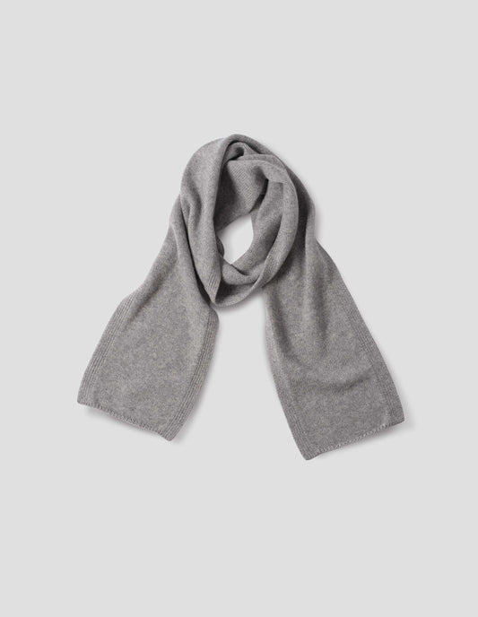 Light grey knitted cashmere scarf, front flat lay view.