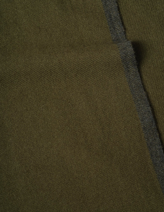 Green cashmere scarf fabric swatch.