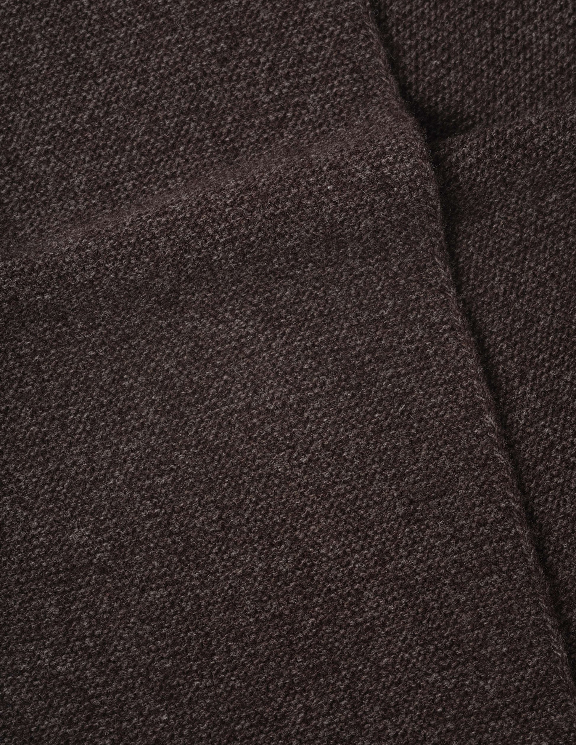 Brown textured knitted yak, wool and cashmere scarf, fabric swatch.